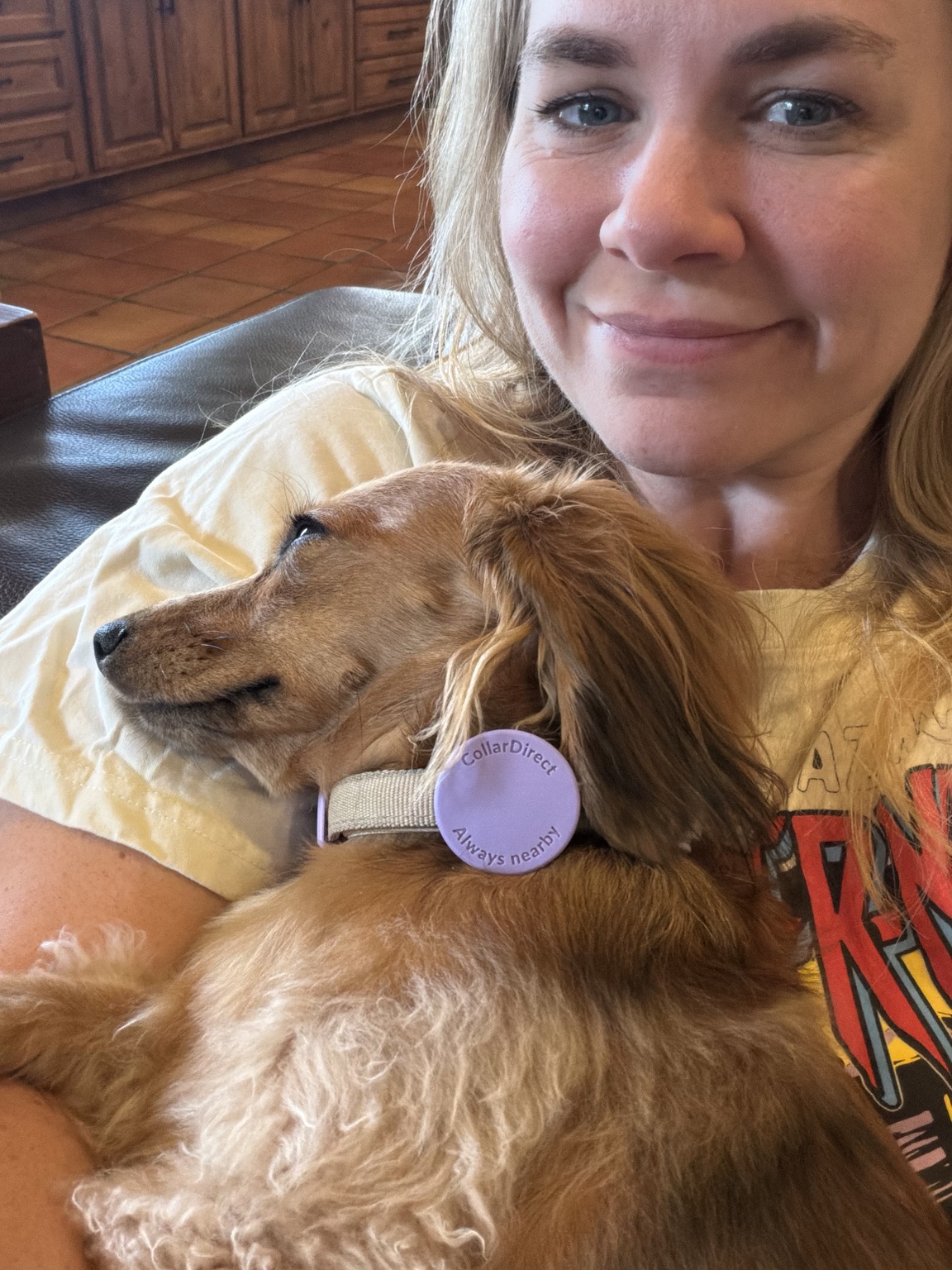 Allison relaxing with her dog Millie